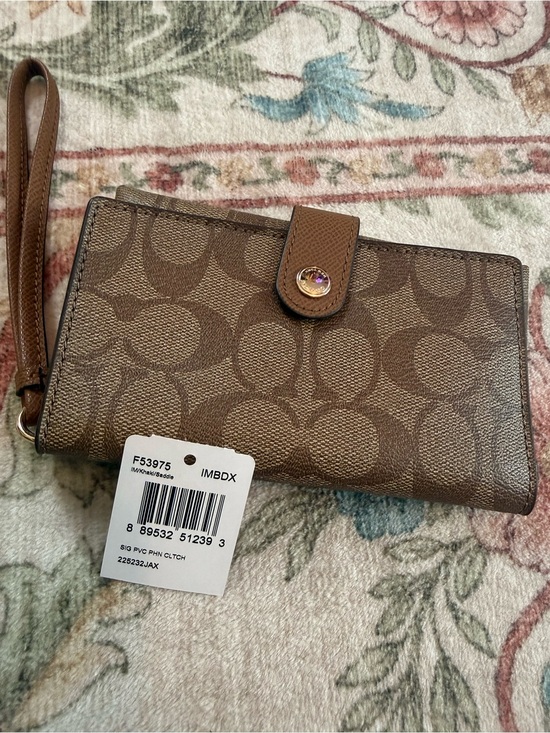 Coach Handbags - Coach Brown Signature Canvas Wristlet